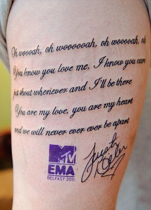 The girl hoped that her tattoo would prove her dedication to music, thus landing her VIP tickets offered by MTV to the most devoted fan