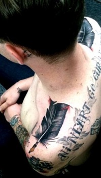 shoulder-tattoos-men-feathers