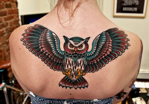 татуировка совы на спине