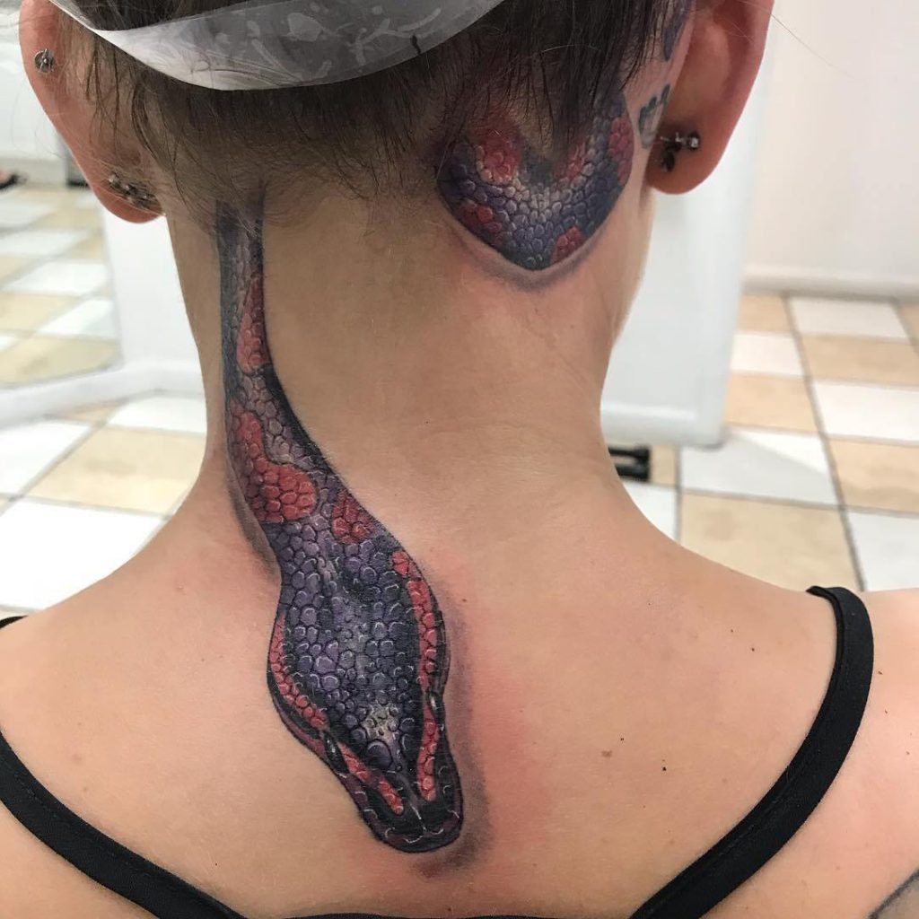  значение татуировки змеи