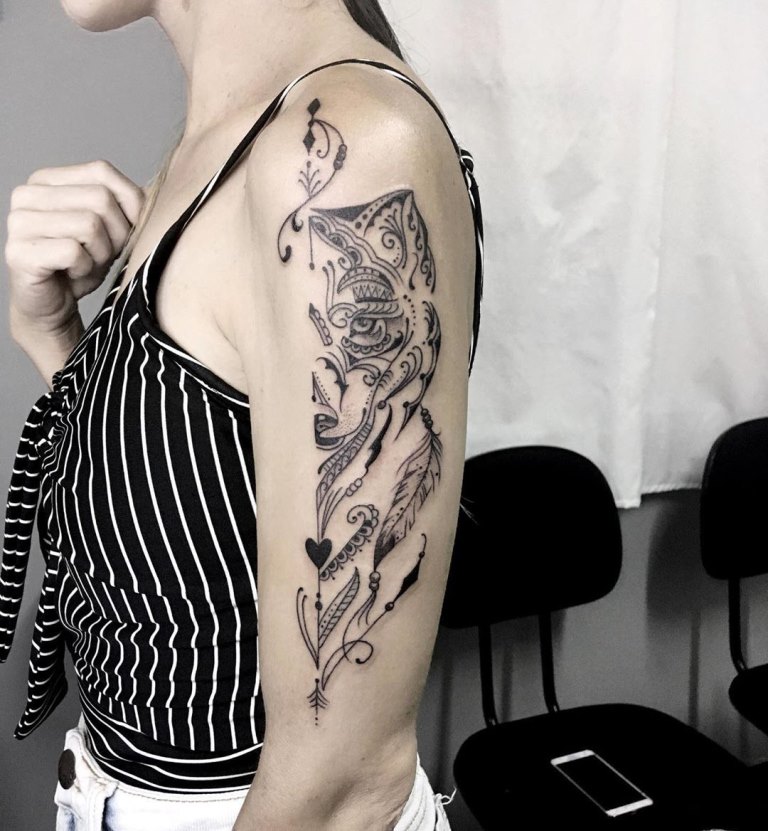 татуировка волчица