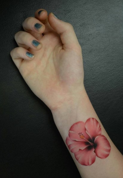 Pink Hibiscus Wrist Tattoo by Ryson Lapenia