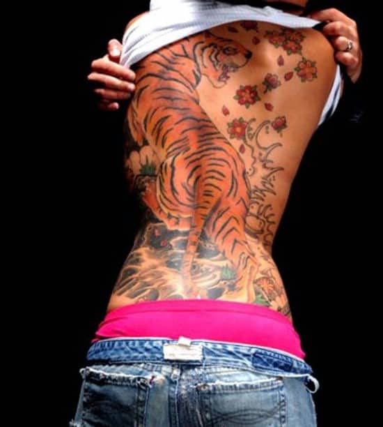 tiger tattoo on back of woman
