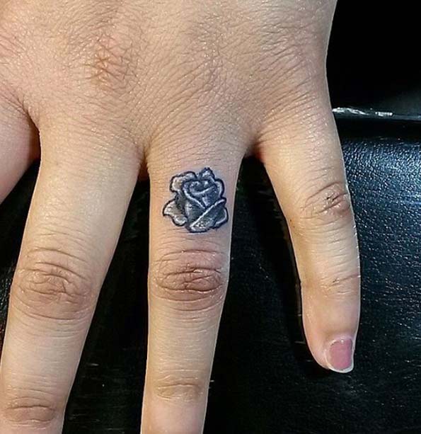 Rose Finger Tattoo by Richie Nigro