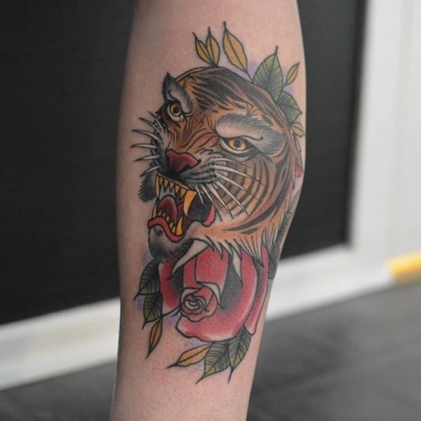 tiger and rose tattoo on arm