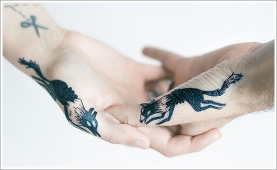 wolf tattoos on hands