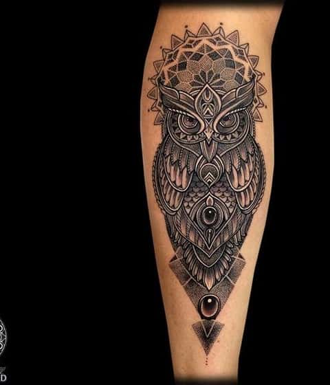 owl tattoo on arm