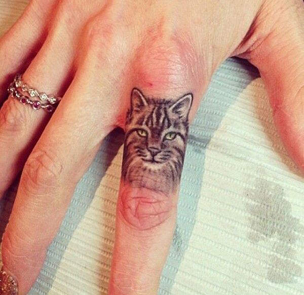 Cat Finger Tattoo